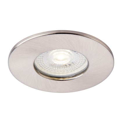 Round silver recessed light fixture on a white background