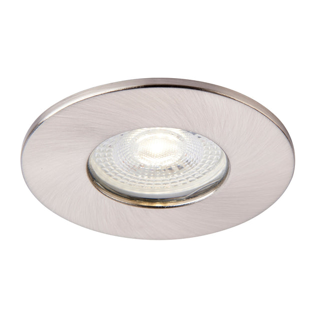 Round silver recessed light fixture on a white background