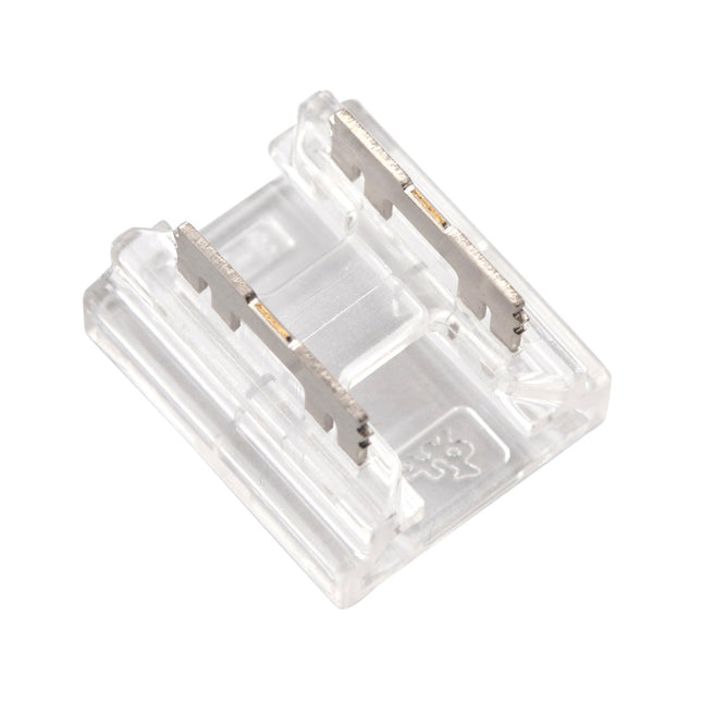 Clear plastic component on a white background