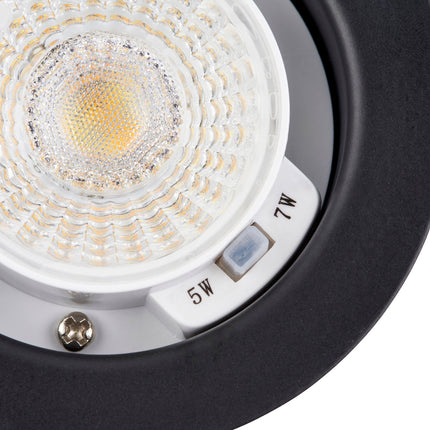 Close-up of a LED light bulb with visible wattage marking.