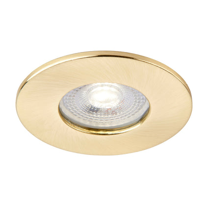 Brass recessed ceiling light on a white background