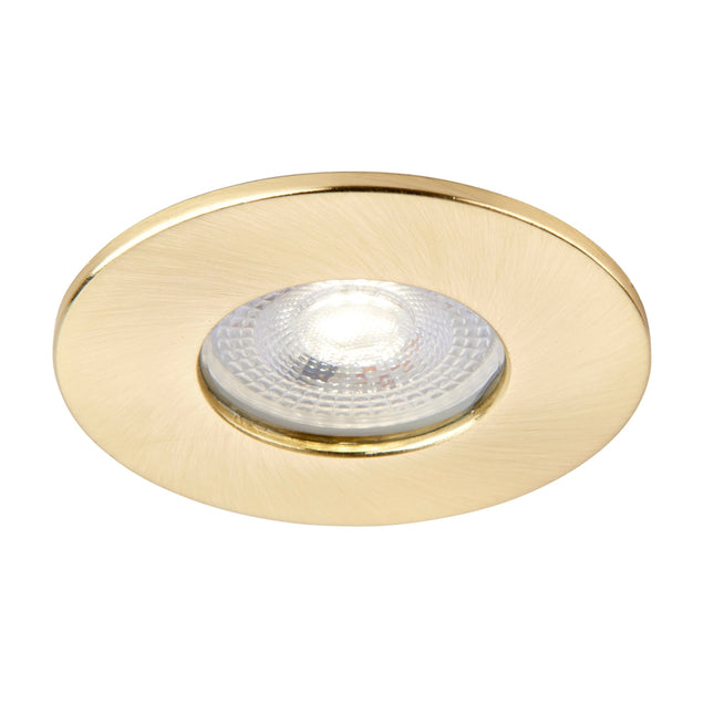Brass recessed ceiling light on a white background