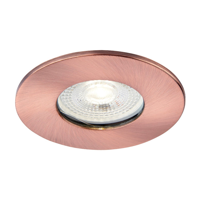 Copper-framed recessed light fixture on a white background