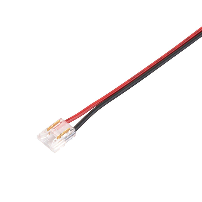 Wire connector with red and black wires on a white background
