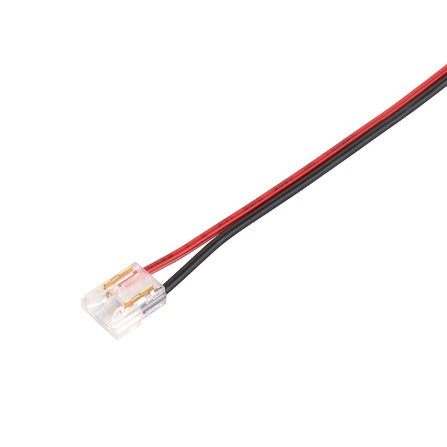 Wire connector with red and black wires on a white background