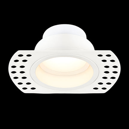 White recessed ceiling light on a white background