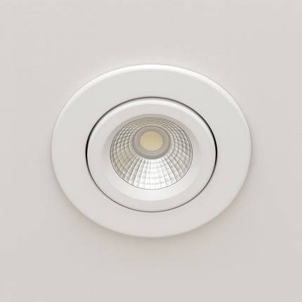 White recessed ceiling light on a plain white background