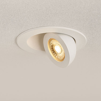 White recessed ceiling light fixture on a neutral gray background